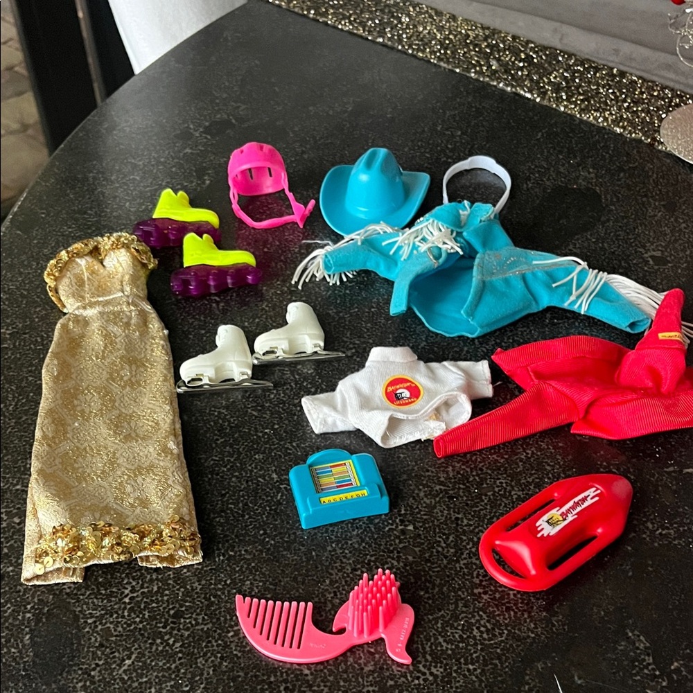 Vintage 1990s Barbie doll bundle of accessories. Gown, rodeo, Baywatch, skater.